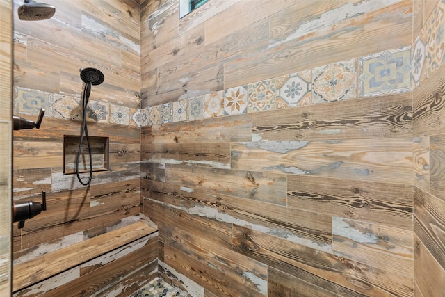 139 County Road 2525, Decatur, TX 76234 - bathroom with a tile shower and wood walls