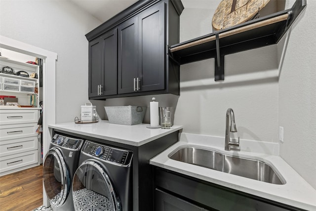 139 County Road 2525, Decatur, TX 76234 - laundry room featuring cabinet space, washing machine and clothes dryer, and dark wood-style floors