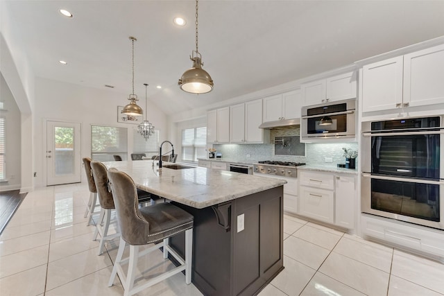 12748 Oakvale Trl, Fort Worth, TX 76244 - kitchen with stainless steel appliances, light tile patterned floors, a sink, decorative backsplash, and recessed lighting