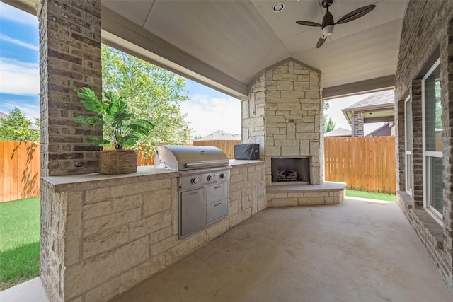 12748 Oakvale Trl, Fort Worth, TX 76244 - view of patio / terrace with an outdoor stone fireplace and ceiling fan