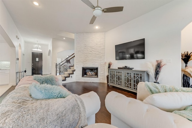 12748 Oakvale Trl, Fort Worth, TX 76244 - living area with arched walkways, wood finished floors, ceiling fan, recessed lighting, and a chandelier
