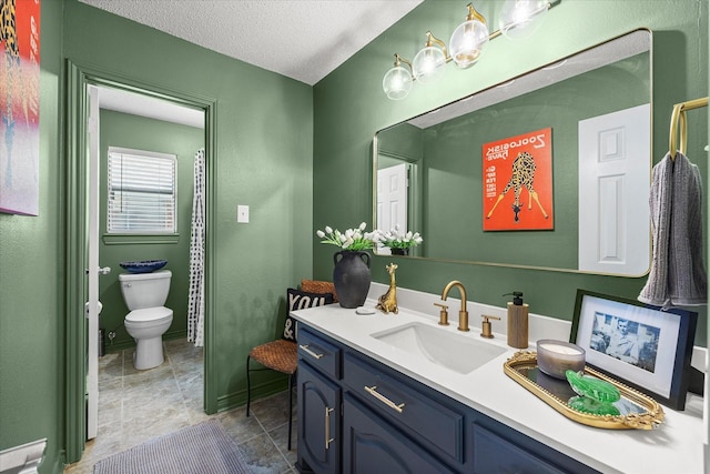 509 Windsor Way, Rockwall, TX 75087 - bathroom with toilet, vanity, a textured ceiling, curtained shower, and baseboards
