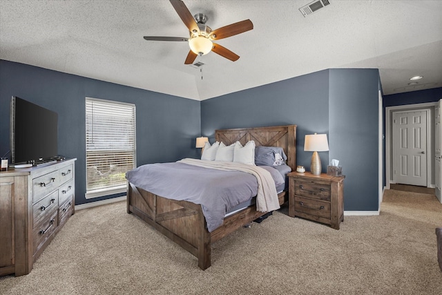 509 Windsor Way, Rockwall, TX 75087 - bedroom with light colored carpet, baseboards, ceiling fan, and a textured ceiling