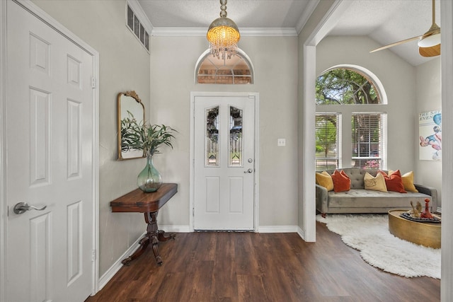 509 Windsor Way, Rockwall, TX 75087 - foyer entrance featuring ceiling fan, dark wood finished floors, baseboards, a textured ceiling, and vaulted ceiling