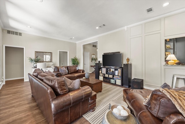 509 Windsor Way, Rockwall, TX 75087 - living area with wood finished floors, ornamental molding, baseboards, and recessed lighting