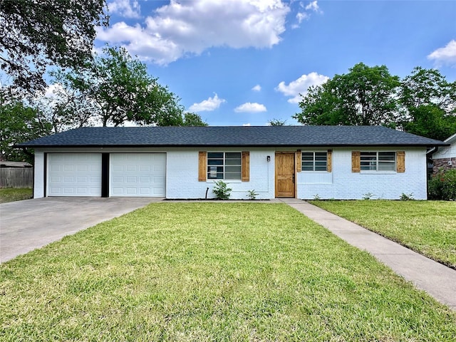 2013 S High St, Brady, TX 76825 - ranch-style house featuring a garage, a front yard, brick siding, concrete driveway, and roof with shingles