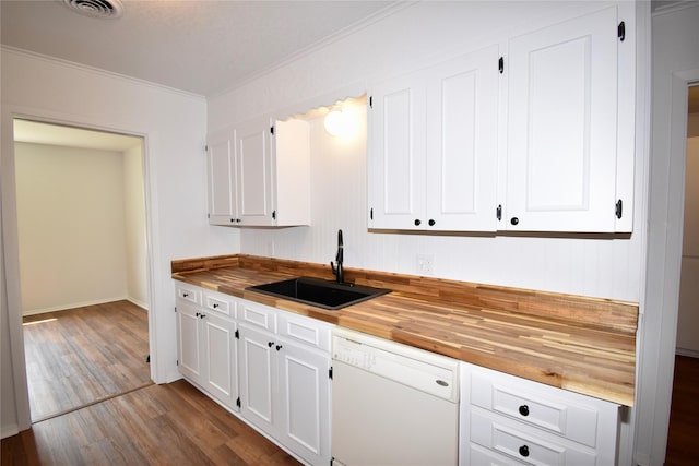 2013 S High St, Brady, TX 76825 - kitchen featuring white dishwasher, wooden counters, a sink, ornamental molding, and dark wood-type flooring