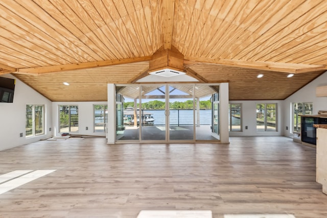 215 N Beverly Dr, Malakoff, TX 75148 - exercise area with vaulted ceiling, wood ceiling, wood finished floors, a water view, and a wall mounted air conditioner
