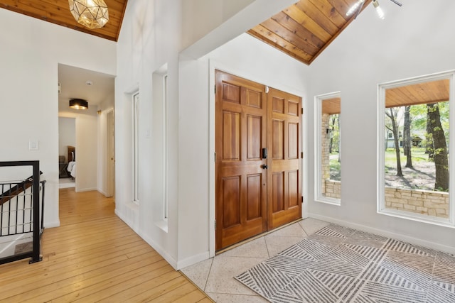 215 N Beverly Dr, Malakoff, TX 75148 - entrance foyer with wood ceiling, baseboards, and high vaulted ceiling