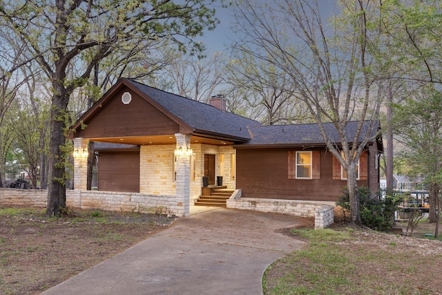 215 N Beverly Dr, Malakoff, TX 75148 - ranch-style home featuring a chimney, a shingled roof, and driveway