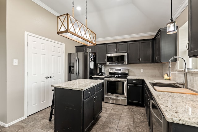 305 Margaret St, Fate, TX 75189 - kitchen with appliances with stainless steel finishes, a sink, dark cabinetry, decorative backsplash, and crown molding