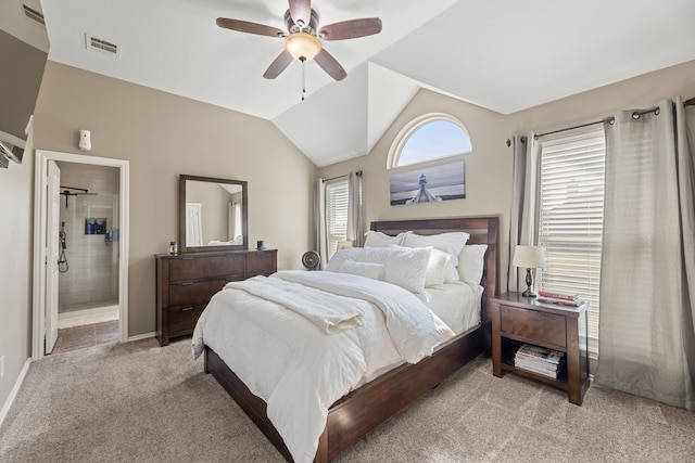 305 Margaret St, Fate, TX 75189 - bedroom featuring light carpet, lofted ceiling, ceiling fan, ensuite bathroom, and baseboards