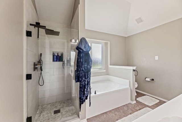 305 Margaret St, Fate, TX 75189 - full bath with a bath, lofted ceiling, toilet, a stall shower, and baseboards