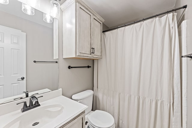 305 Margaret St, Fate, TX 75189 - full bathroom with vanity, toilet, and a shower with shower curtain