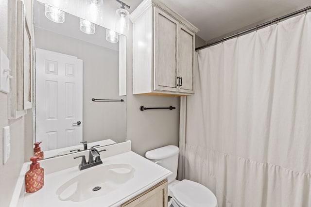 305 Margaret St, Fate, TX 75189 - bathroom featuring vanity and toilet