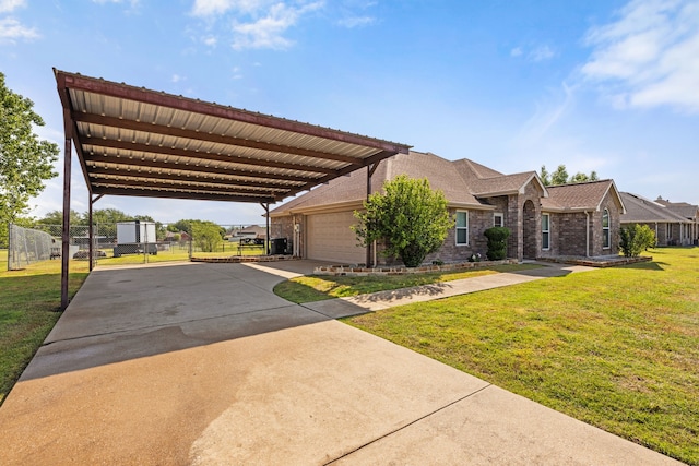 305 Margaret St, Fate, TX 75189 - view of front of home with a carport, concrete driveway, an attached garage, and brick siding