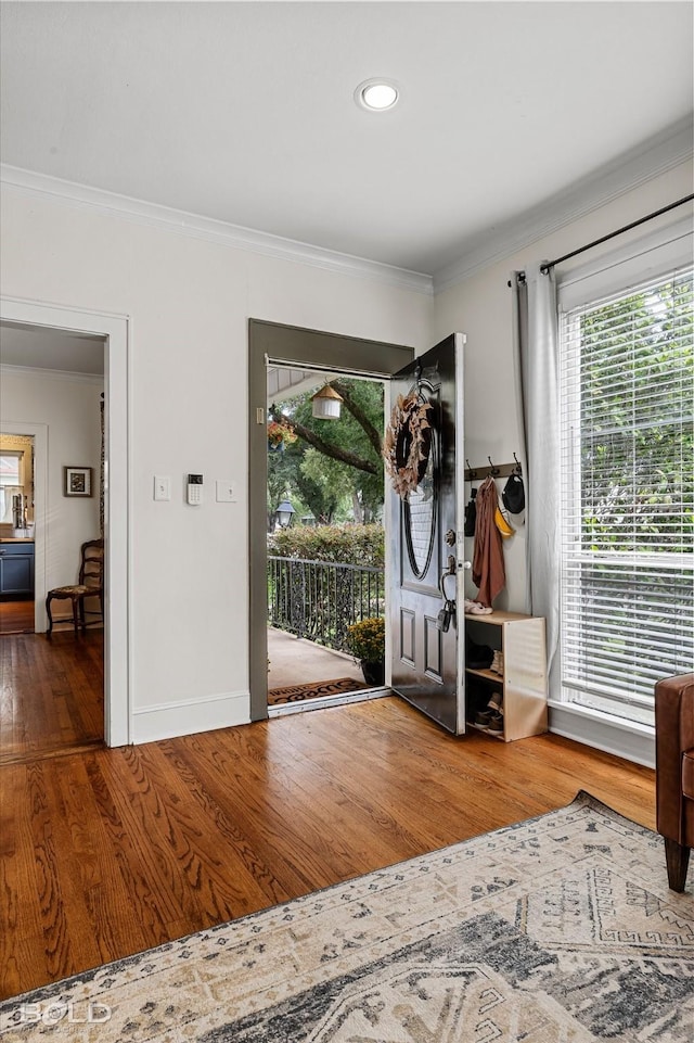 3526 Greenway Pl, Shreveport, LA 71105 - entrance foyer featuring wood finished floors, ornamental molding, baseboards, and recessed lighting