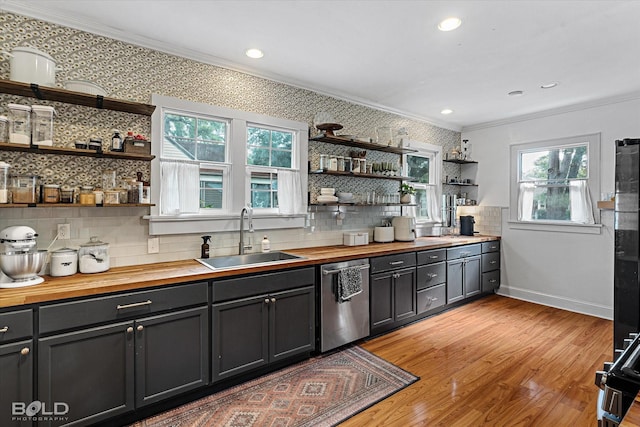 3526 Greenway Pl, Shreveport, LA 71105 - bar with stainless steel dishwasher, a sink, ornamental molding, decorative backsplash, and light wood finished floors