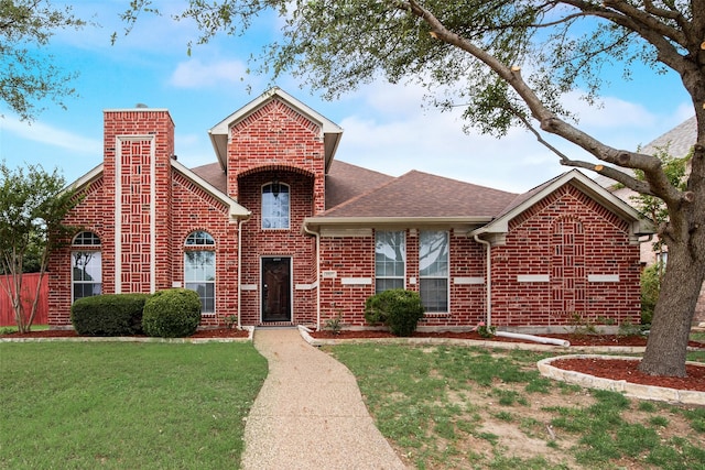 2917 Cascade Dr, Plano, TX 75025 - traditional-style home featuring brick siding, a shingled roof, and a chimney