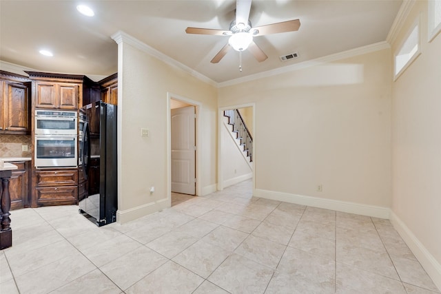 2917 Cascade Dr, Plano, TX 75025 - kitchen featuring freestanding refrigerator, crown molding, a ceiling fan, double oven, and light countertops