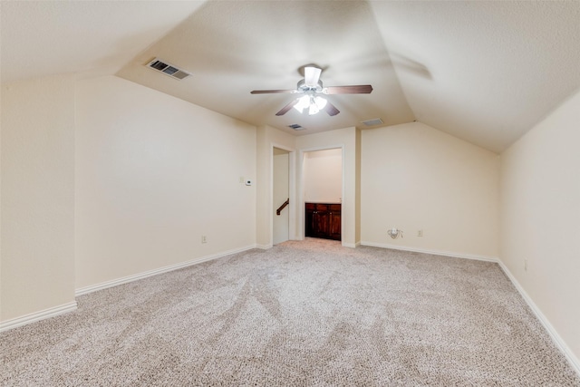 2917 Cascade Dr, Plano, TX 75025 - bonus room with vaulted ceiling, light carpet, a ceiling fan, and baseboards