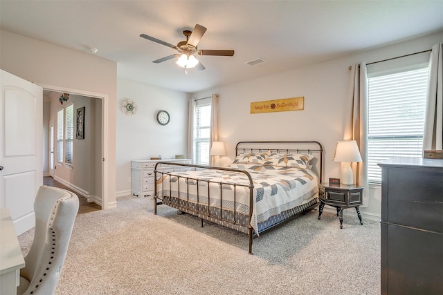 128 Colonial Dr, Joshua, TX 76058 - carpeted bedroom featuring ceiling fan and baseboards