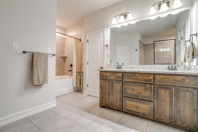 128 Colonial Dr, Joshua, TX 76058 - full bath with tile patterned floors, double vanity, shower / bathtub combination with curtain, and baseboards
