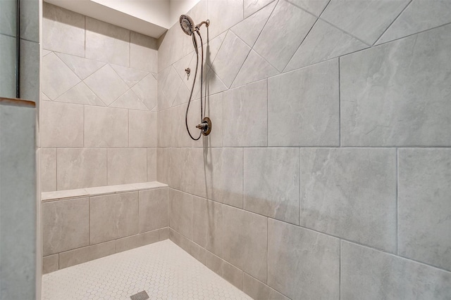 128 Colonial Dr, Joshua, TX 76058 - bathroom featuring a tile shower