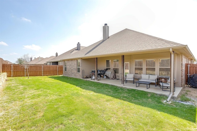 128 Colonial Dr, Joshua, TX 76058 - rear view of house with a patio, an outdoor hangout area, a chimney, and brick siding