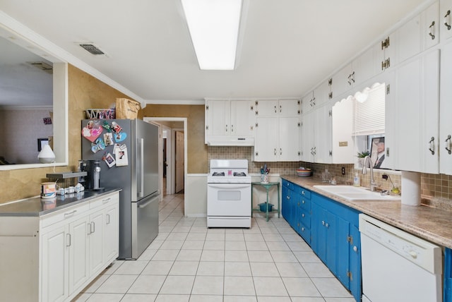210 Aikens St, Lipan, TX 76462 - kitchen featuring white appliances, under cabinet range hood, blue cabinetry, a sink, and decorative backsplash