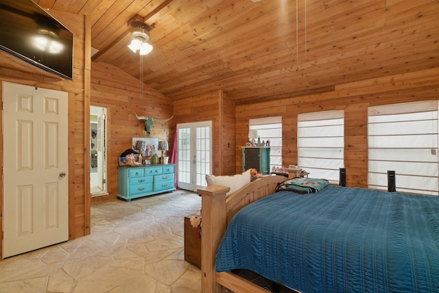 210 Aikens St, Lipan, TX 76462 - bedroom with vaulted ceiling, stone floors, french doors, wood ceiling, and wooden walls