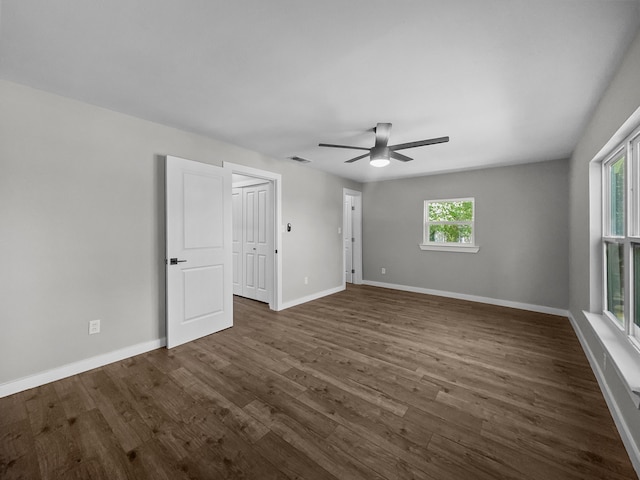 102 Bois D Arc St, Whitesboro, TX 76273 - unfurnished room with a ceiling fan, dark wood finished floors, and baseboards