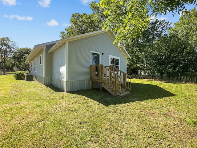 102 Bois D Arc St, Whitesboro, TX 76273 - rear view of property featuring central AC