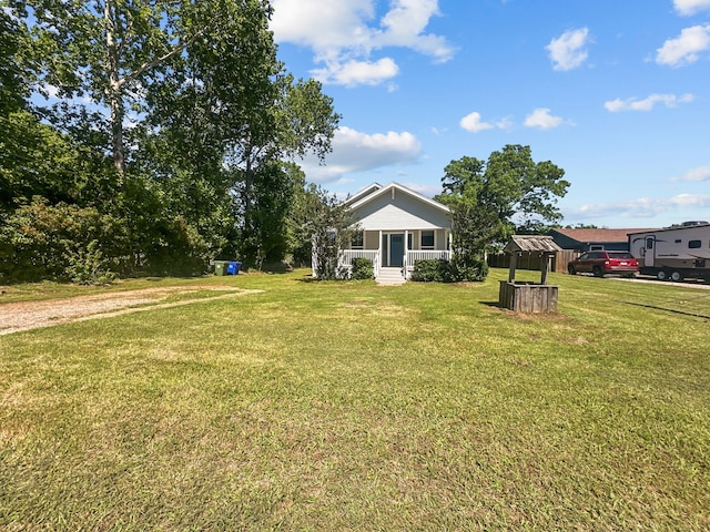 102 Bois D Arc St, Whitesboro, TX 76273 - view of green lawn featuring entry steps