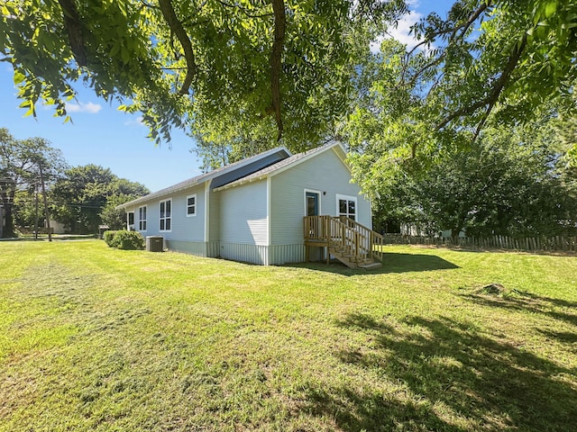 102 Bois D Arc St, Whitesboro, TX 76273 - back of property with cooling unit