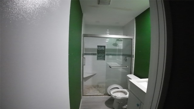 1817 Lewis Dr, Garland, TX 75041 - full bathroom featuring toilet, vanity, and a shower stall