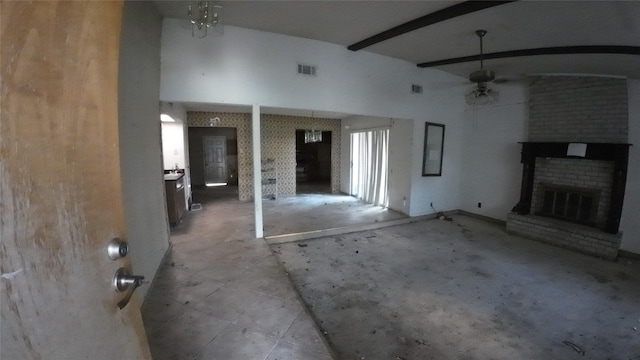 1817 Lewis Dr, Garland, TX 75041 - unfurnished living room featuring ceiling fan, a brick fireplace, and beamed ceiling