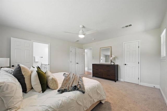 342 Willow Wood St, Murphy, TX 75094 - bedroom with baseboards, light colored carpet, connected bathroom, and ceiling fan