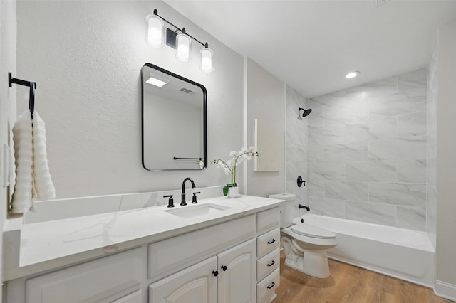 342 Willow Wood St, Murphy, TX 75094 - full bathroom featuring vanity, wood finished floors, toilet, bathtub / shower combination, and recessed lighting