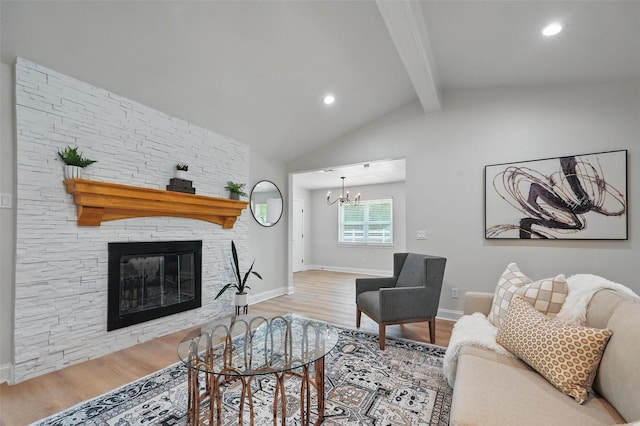 342 Willow Wood St, Murphy, TX 75094 - living area with wood finished floors, a chandelier, a stone fireplace, recessed lighting, and baseboards