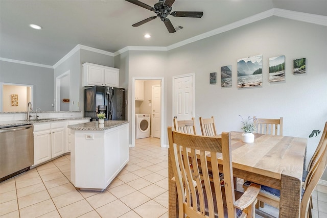 2900 Miles Way, Bedford, TX 76021 - kitchen with dishwasher, washer / clothes dryer, black fridge, a sink, and a ceiling fan