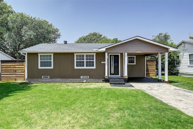 12111 Galva Dr, Dallas, TX 75243 - view of front facade featuring crawl space, driveway, roof with shingles, and a carport