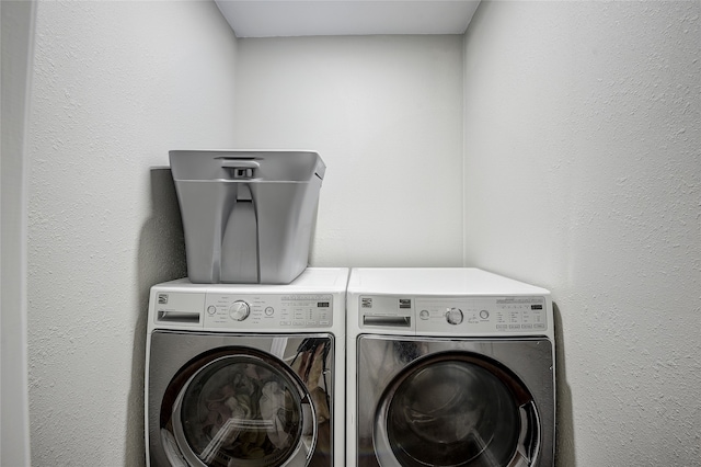12111 Galva Dr, Dallas, TX 75243 - laundry room featuring separate washer and dryer