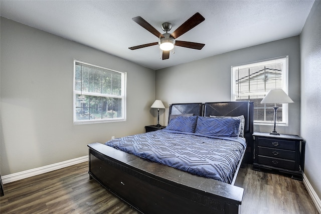 12111 Galva Dr, Dallas, TX 75243 - bedroom with wood finished floors, baseboards, and ceiling fan