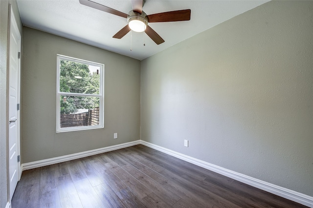12111 Galva Dr, Dallas, TX 75243 - empty room featuring dark wood-style flooring, baseboards, and ceiling fan