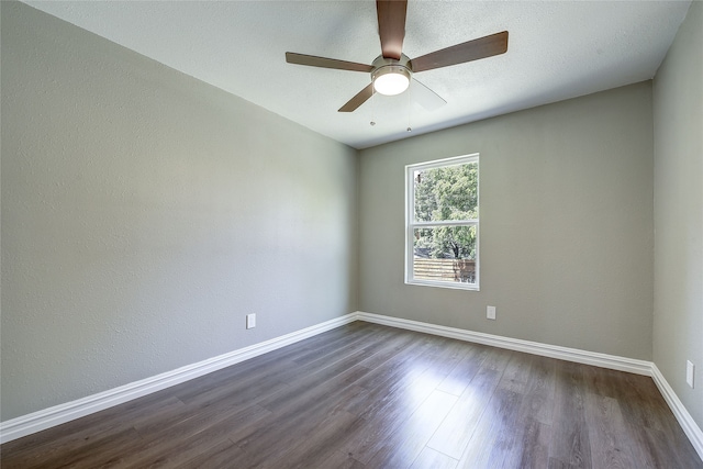 12111 Galva Dr, Dallas, TX 75243 - empty room featuring dark wood finished floors, baseboards, and ceiling fan