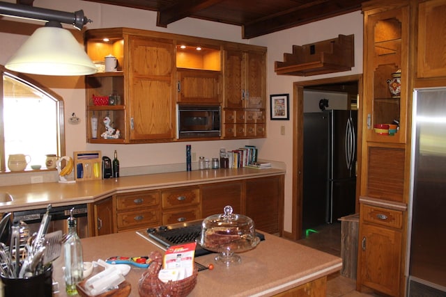 801 County Road 313, Eastland, TX 76448 - kitchen featuring black appliances, brown cabinetry, light countertops, open shelves, and light tile patterned floors