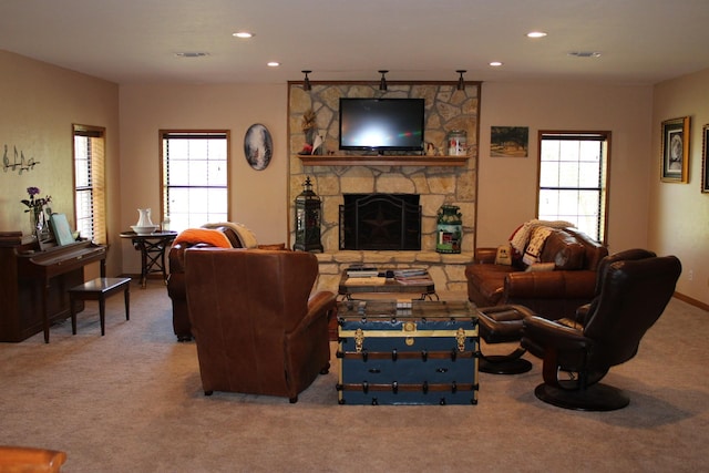 801 County Road 313, Eastland, TX 76448 - carpeted living room featuring a fireplace and recessed lighting