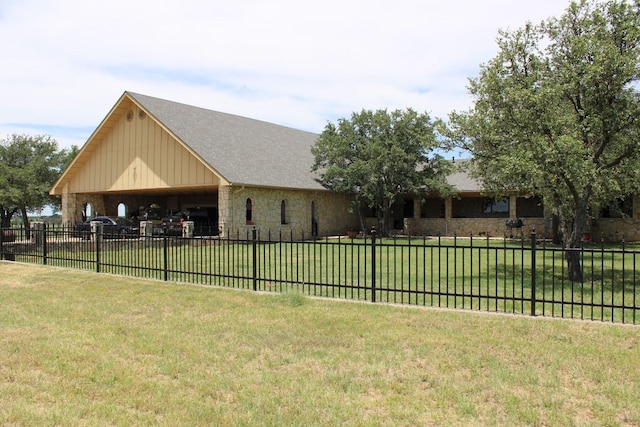 801 County Road 313, Eastland, TX 76448 - view of front of house with stone siding, board and batten siding, and a carport