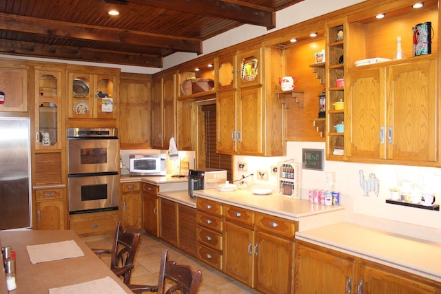 801 County Road 313, Eastland, TX 76448 - kitchen featuring appliances with stainless steel finishes, wood ceiling with exposed beams, light countertops, light tile patterned floors, and open shelves
